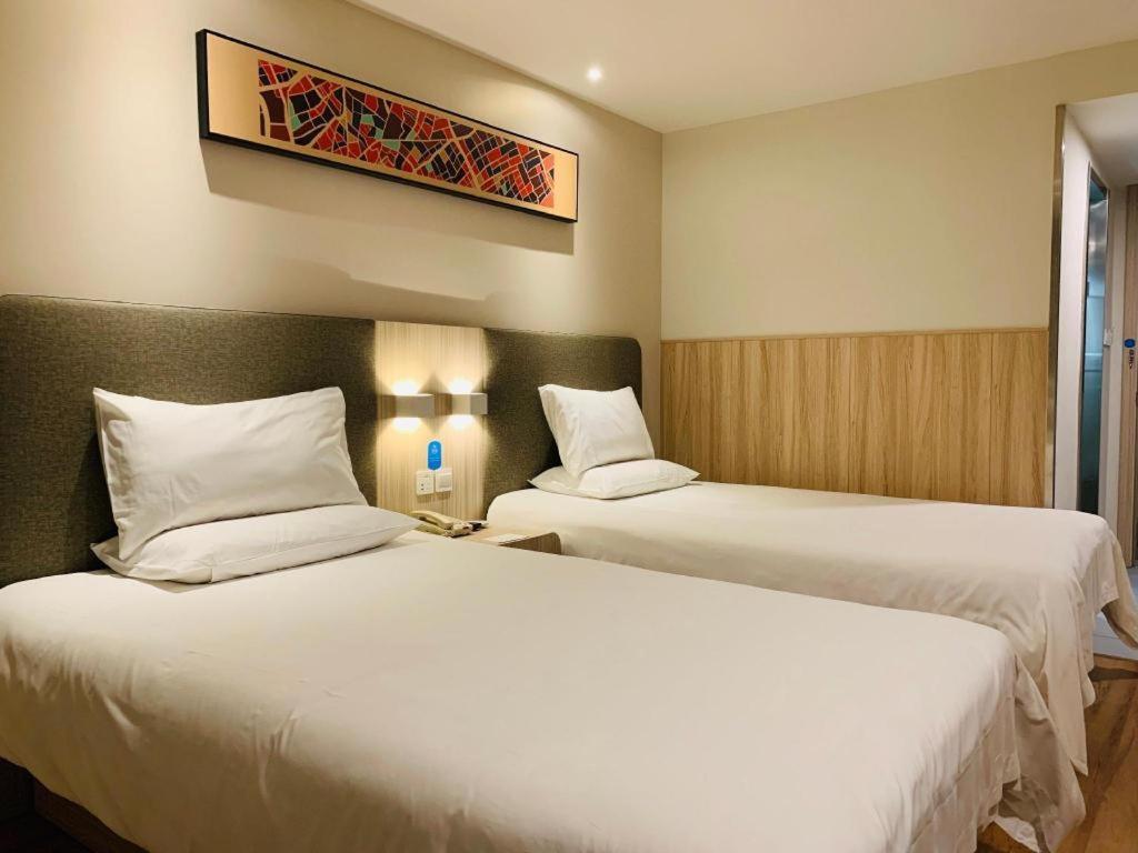 Hanting Hotel Guangzhou Sanyuanli Metro Station Exterior foto